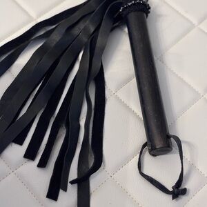 Elegant Black Leather Tassel Accessory